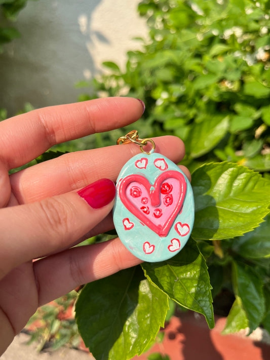 Teal and pink hearts keychain